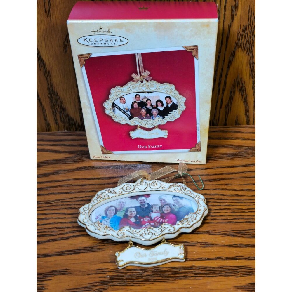 Hallmark Keepsake Ornament "Our Family" 2004 Porcelain Frame With Ribbon Hanging